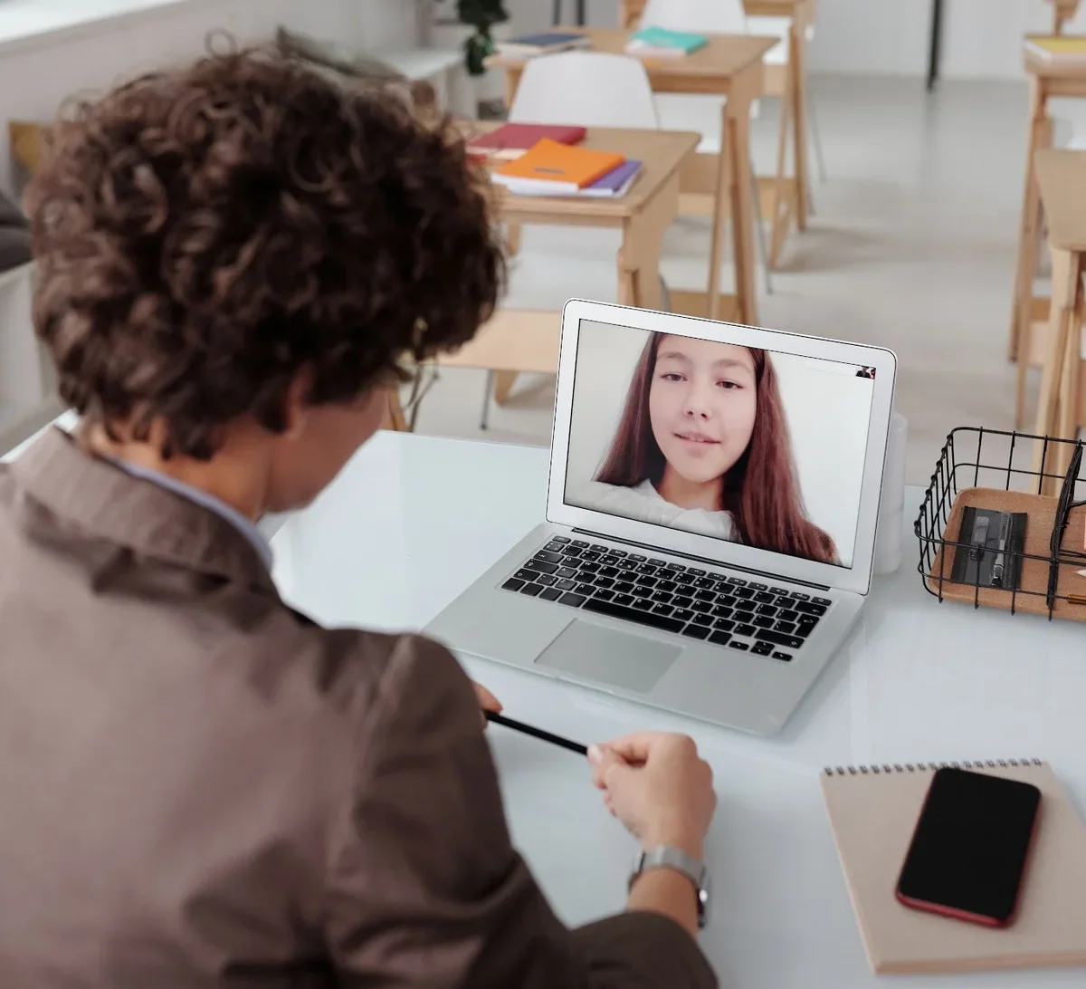 A student participates in an online lesson via laptop Max Fischer  Pexels 6